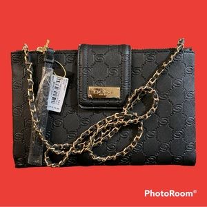 New black BEBE bag you can use as a shoulder or a crossbody bag! Super cute!
